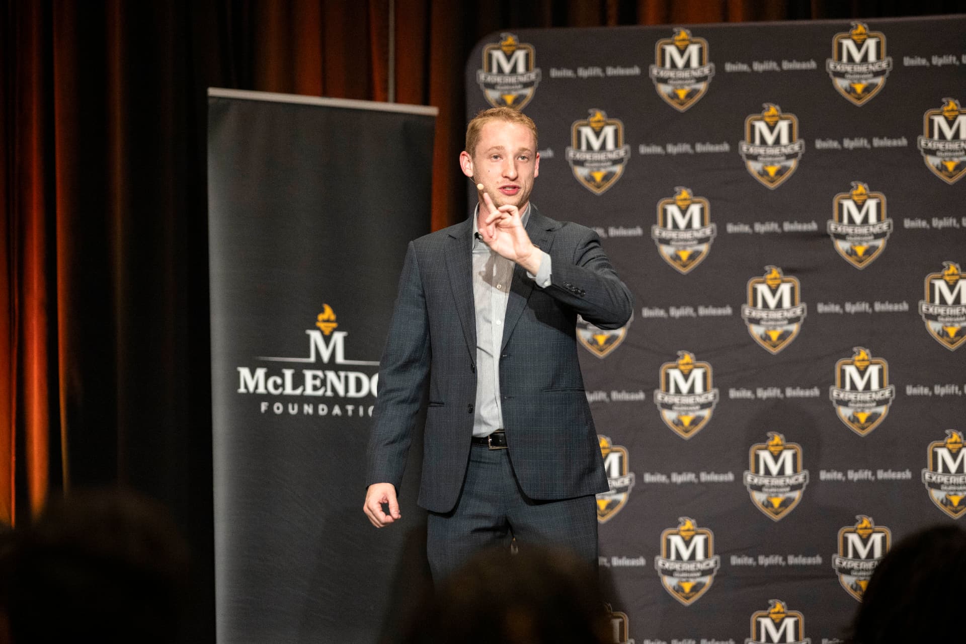 Speaker addressing attendees at the McLendon Experience 2026