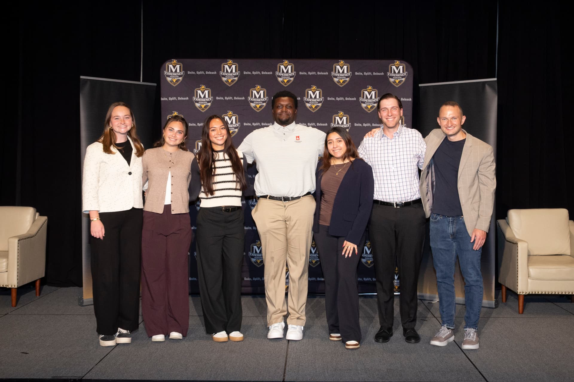 Carthage College group together on stage at The McLendon Experience in Durham