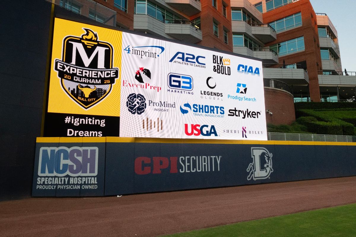 The McLendon Experience partner logo board at the ballpark