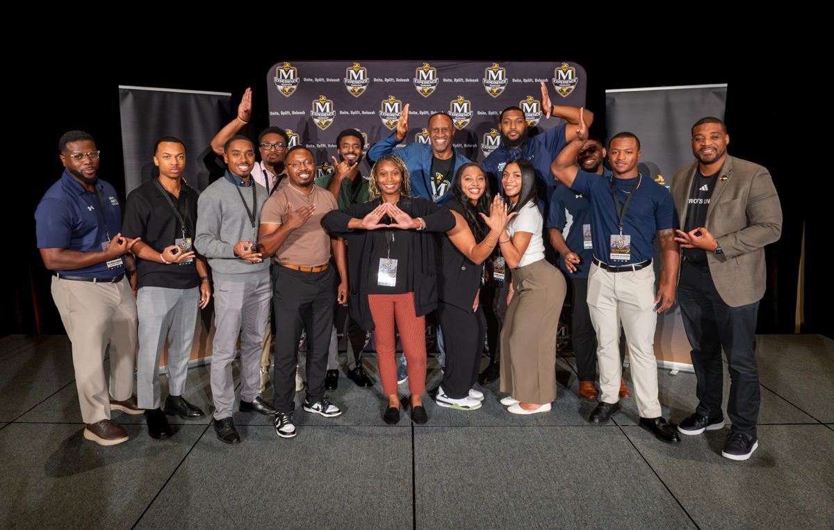 McLendon Experience participants and leaders on stage in Durham