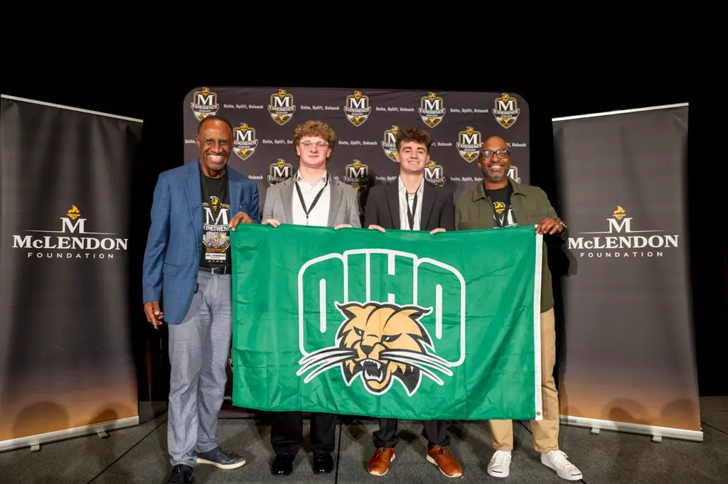 McLendon Experience attendees with Ohio University flag