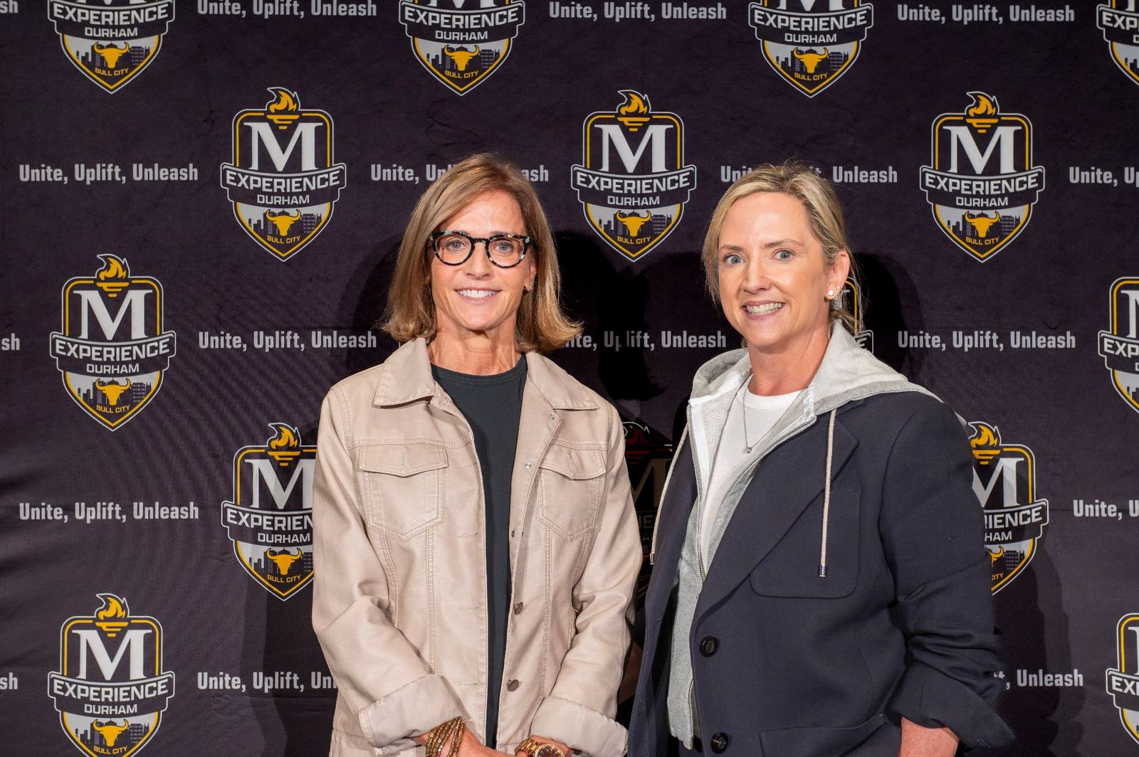 Two McLendon Foundation leaders standing together at The McLendon Experience