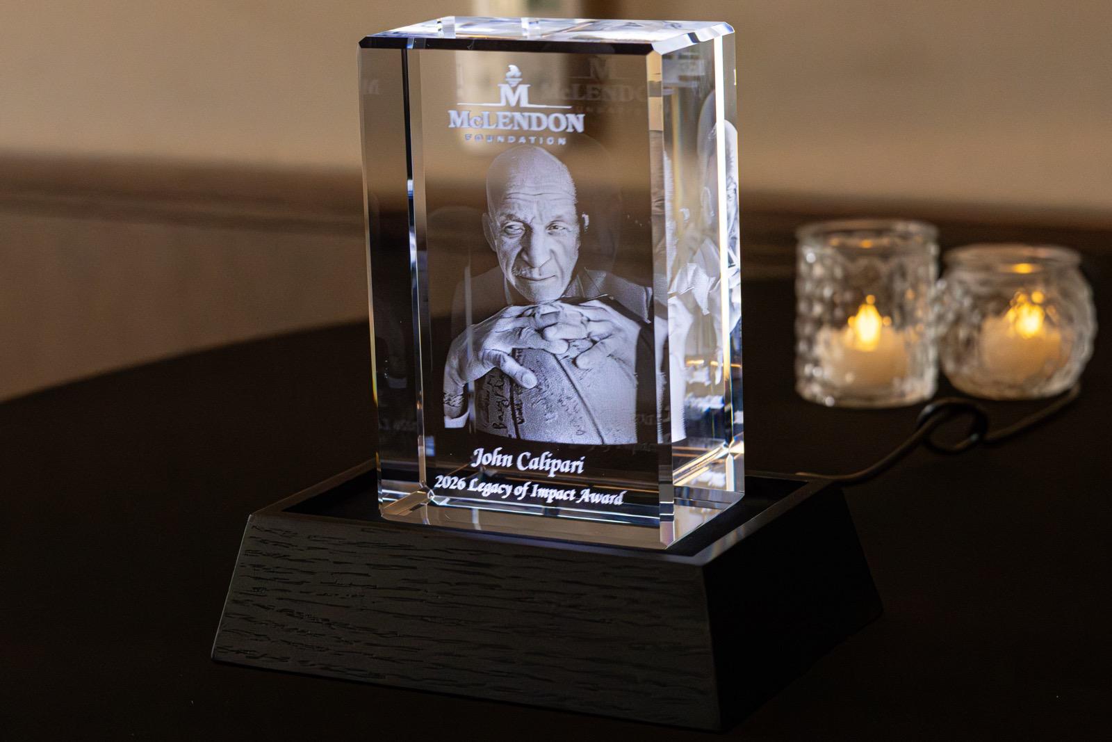 The McLendon Foundation Legacy of Impact Award crystal presented to John Calipari